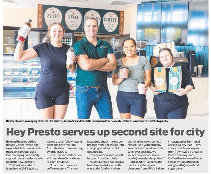 Newspaper article with a photo of four people in a coffee shop, featuring coffee products and branding.